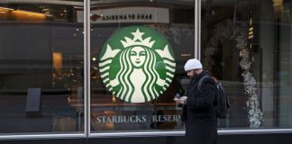 Starbucks to pay about $35M to NYC workers to settle claims it violated labor law