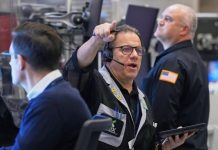 Stock market sinks as AI and interest rate worries grip investors