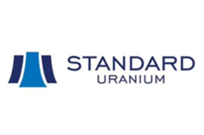 Investor Insight
Standard Uranium offers high-grade uranium discovery potential in the Athabasca Basin. With a fully funded drill program scheduled for spring 2026 at its flagship Davidson River project, and joint ventures on other highly prospective projects, the company provides investors early stage exposure to the emerging nuclear energy market.
Overview
Standard Uranium (TSXV:STND,USOTC:STTDF,FRA:9SU0) is a uranium exploration and project generation company focused on advancing high-grade uranium discoveries within the world-famous Athabasca Basin in Saskatchewan, Canada.
With a mission to “supply the fuel for a clean energy future,” Standard Uranium is focused on discovering and developing basement-hosted and unconformity-related uranium deposits that can power the growth of nuclear energy. Its dual-track model combines aggressive exploration at its flagship Davidson River project with a robust project generator platform, advancing multiple projects through partnerships while generating non-dilutive cash flow in operator fees, share payments, and royalties.
With 13 projects totaling more than 235,000 acres, Standard Uranium offers investors exposure to both immediate discovery catalysts and long-term portfolio value. Its leadership team brings deep geological expertise and operational experience across the Athabasca Basin, complemented by disciplined capital management.
As global governments reaffirm nuclear energy’s role in achieving net-zero targets, Standard Uranium is positioned to capitalize on the growing demand for secure, high-grade uranium supply from Canada.
Company Highlights
<strong>Flagship Davidson River Project:</strong> Large-scale, high-priority exploration asset in the southwest Athabasca Basin, along trend from NexGen’s Arrow and Paladin Energy’s Triple R uranium deposits, positioned for a significant uranium discovery.
<strong>Extensive Portfolio in the Athabasca Basin: </strong>Over 235,000 acres (95,000+ hectares) across 13 projects in Canada’s premier uranium district, including active joint ventures at Sun Dog, Corvo, and Rocas.
<strong>Project Generator Model:</strong> Leverages strategic partnerships to fund exploration and generate cash flow while retaining upside through 25 percent ownership and a 2.5 percent net smelter return (NSR) royalty on joint-venture projects.
<strong>Fully Funded for Davidson River Drill Campaign:</strong> Financing completed to support 8,000 to 10,000 meters of drilling at Davidson River, planned for spring 2026.
<strong>Rocas Drill Program: </strong><strong>The first-ever drill program to be conducted on Rocas will commence in winter 2026, comprising approximately 1,800 metres.</strong>
<strong>Corvo Drill Program: </strong>A skid-assisted diamond drill program totalling approximately 3,000 metres is planned for winter 2026, which will mark the first drill program on the Project in more than 40 years.
<strong>Riding the Nuclear Power Renaissance:</strong> Positioned to benefit from global decarbonization trends and a long-term rise in uranium demand.
<strong>Proven Team:</strong> Led by experienced geologists and exploration professionals with a track record of discoveries in the Athabasca Basin.
Key Projects
Davidson River Project
Located in the southwest Athabasca Basin, approximately 25 kilometres west of NexGen’s Arrow deposit and Paladin Energy’s Triple R deposit, the Davidson River project spans 30,737 hectares across 10 contiguous mineral claims. The property lies along the same structural trends that hosts these globally significant discoveries.
To date, Standard Uranium has drilled 16,561 metres across 39 holes, intersecting wide, graphitic-sulphidic shear zones, structural deformation, and alteration features characteristic of high-grade basement uranium systems. Recent multiphysics and machine learning-assisted surveys conducted in partnership with Fleet Space Technologies and GoldSpot Discoveries have provided new three-dimensional imaging of subsurface structures, identifying refined targets along the Warrior, Bronco and Thunderbird corridors.
The company is preparing for an 8,000 to 10,000-meter diamond drill campaign scheduled for spring 2026, marking its most comprehensive program to date. With modern targeting data and strong geological indicators, Davidson River represents the company’s clearest path to a transformational discovery in the southwest Athabasca Basin.
Sun Dog Project (JV)
Located in the northwestern Athabasca Basin near Uranium City, the Sun Dog project consists of nine mineral claims totaling 19,603 hectares. This highly prospective property sits in a historically productive uranium district that remains underexplored by modern methods.
Surface sampling has identified several uranium-rich showings, including modern grab samples returning grades up to 3.58 percent U₃O₈. The project’s targets are associated with structural intersections and alteration zones consistent with basement-hosted and unconformity-related uranium systems.
Standard Uranium has partnered with Aero Energy, under a three-year earn-in agreement, allowing Aero to acquire up to a 100 percent interest in the project. The partnership structure ensures ongoing advancement at Sun Dog with Standard Uranium retaining a 2.5 percent NSR royalty, providing continued exposure to discovery success without direct funding requirements.
Corvo Project (JV)
The Corvo project in the eastern Athabasca Basin covers 12,265 hectares and represents one of Standard Uranium’s most promising partner-funded assets. The project lies along three major magnetic low and EM conductor trends extending for nearly 29 kilometres of prospective strike length.
The project is currently being advanced under a joint venture with Aventis Energy, which is funding exploration work through a three-year earn-in agreement. Standard retains a 25 percent ownership interest and a 2.5 percent NSR, while acting as operator during the earn-in phase.
Historical drilling and sampling have confirmed uranium mineralization, including the “Manhattan” showing, where modern surface grab samples collected by the company in 2025 returned assays up to 8.10 percent U3O8. These results highlight the property’s potential to host near-surface, high-grade uranium deposits.
Rocas Project (JV)
The Rocas project, located in the southeastern Athabasca Basin region, lies approximately 75 km southwest of the Key Lake mine and mill and covers 4,002 hectares along a 7.5-km northeast-trending magnetic low and EM conductor corridor.
Surface exploration has confirmed uranium mineralization at outcrop, with historical grab samples grading up to 0.5 percent U₃O₈ across nearly 900 metres of strike length. Historical surveys have also identified lakebed geochemical anomalies and structural features that indicate potential zones of hydrothermal alteration, ideal settings for basement-hosted uranium deposits.
In 2025, Standard Uranium executed an option agreement with Collective Metals, granting the partner 75 percent earn-in over three years in exchange for staged cash payments, share issuances, and $4.5 million in exploration spending. Standard retains a 25 percent ownership interest and a 2.5 percent NSR, while acting as operator during the earn-in phase.
Eastern Athabasca Exploration Projects
Beyond its flagship and joint-venture assets, Standard Uranium holds eight additional exploration-stage properties across the eastern Athabasca Basin, including Ascent, Canary, Atlantic, Cable Bay, Ox Lake, Umbra, Brown Lake and Sable. Together, these projects cover over 43,000 hectares of highly prospective ground along established uranium trends near recent discoveries by Denison Mines and IsoEnergy.
These projects represent the company’s pipeline of future partnerships and discovery opportunities, ensuring consistent exploration activity across the Basin.
Management Team
Jon Bey – Chairman, CEO, and Director
Jon Bey is a capital markets executive with over two decades of experience in the junior exploration industry. Bey has explored for uranium, gold, silver, diamonds and oil and gas in the Americas, Europe, Asia and Africa. He has public company experience across several sectors and with companies listed on the TSX, TSXV, CSE and LSE exchanges. Bey is the chairman of Ophir Metals and the founder and managing director of the Steel Rose Group of companies.
Sean Hillacre – President & VP Exploration
Sean Hillacre has over a decade of experience as an economic geologist in the Athabasca Basin uranium district, including five years at NexGen Energy as part of the technical team progressing the Arrow uranium deposit toward production. A high-energy, results oriented geoscientist, Hillacre brings a unique and balanced background integrating academic geoscience with industry experience, along with a comprehensive understanding of project development.
Vivien Chang – Chief Financial Officer
Vivien Chuang is a chartered professional accountant (BC, Canada) with more than 15 years of experience in the resource and mining sector. She was a former CFO of Azincourt Energy, BluEnergies, Muzhu Mining, and Northern Empire Resources, K2 Gold Corporation and Chakana Copper (formerly Remo Resources). Currently, she is VP Finance of Jasper Management and Advisory and president of VC Consulting, which provides CFO and other financial accounting and compliance services to a number of companies.
Neil McCallum – Lead Technical Director
Neil McCallum has over 15 years of experience primarily in North American mineral deposit exploration, with a focus on targeting and discovery of unconformity-related uranium deposits. He is currently a project manager at Edmonton-based Dahrouge Geological Consulting. McCallum has managed and conducted uranium exploration in and around the Athabasca Basin and other jurisdictions for multiple companies.
This post appeared first on investingnews.com